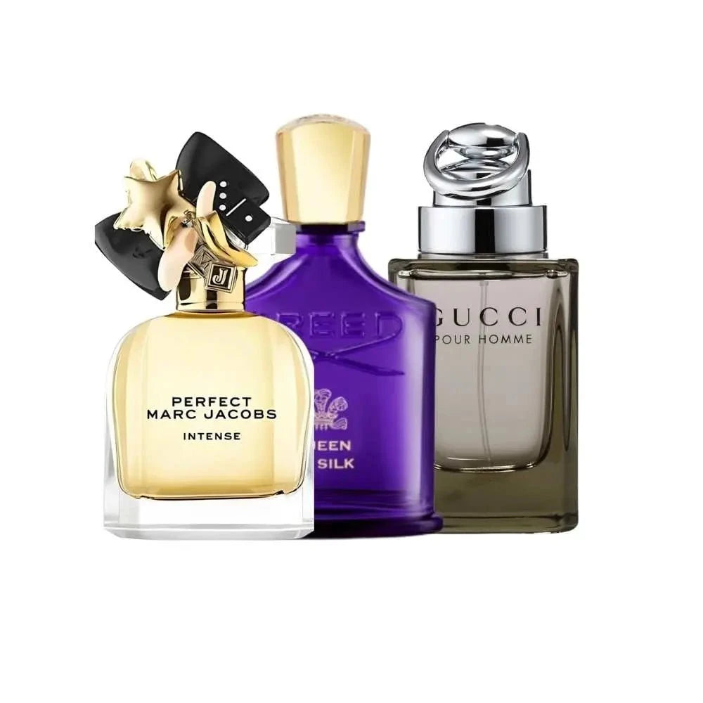 Three perfume bottles from Marc Jacobs, Queen Silk, and Gucci on a white background
